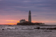 A Spectacular Sunrise At St Mary's Lighthouse In Whitley Bay, As The Sky Erupts In Color