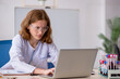 © Elnur - Young female hematologist working at the lab