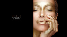 Gold Makeup. Winter Beauty. Fashion Model Girl With Metallic Golden Make-up,. Christmas Woman With Glowing Gold Skin. Beauty Sexy Woman Face With Golden Creative Make Up. Isolated On Black Background