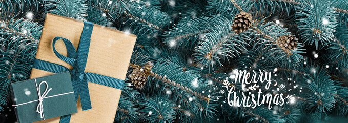 Wall Mural - New Year banner. Presents on blue christmas tree background