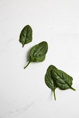 Wall Mural - Top view of organic spinach leaves