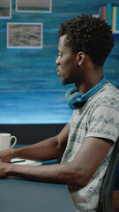 Adult programming web codes on cybersecurity interface. Man working on computer and typing program information for digital server development. Coder using website firewall system