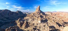 Panoramic View Of Famous Weavers Needle Rock Feature And Superstition Mountains Desert Wilderness From Fremont Saddle On Peralta Canyon Hiking Trail East Of Phoenix, Arizona