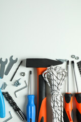 Work tools on white background, top view