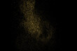 © sergio34 - Gold Glitter Texture Isolated on Black Background. Golden stardust. Amber Particles Color. Sparkles Rain. Vector Illustration, Eps 10.