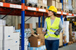 © gpointstudio - Adult caucasian woman working in warehouse