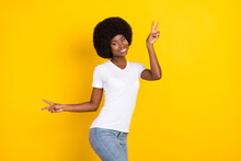 Photo Of Cool Cheerful Dark Skin Young Woman Make V-sign Good Mod Isolated On Yellow Color Background