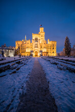 Famous Castle Hluboka Nad Vltavou In The Czech Republic In Winter In The Evening