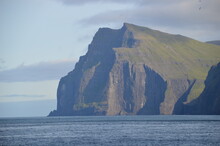 The Green And Blue Dramatic And Wild Coastal Landscapes In The Faroe Islands