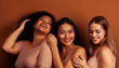 © iordani - young pretty asian, caucasian, african woman posing cheerful together on brown background, lifestyle diverse nationality people concept