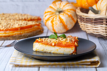 Wall Mural - Handmade delicious pumpkin cheesecake and small pumpkins