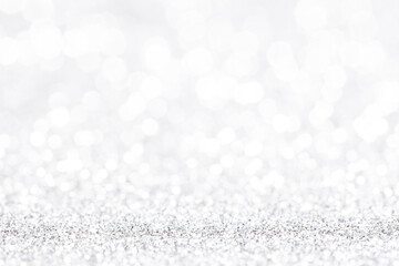 Bokeh gray background. Silver abstract bokeh snow falling winter christmas holiday background