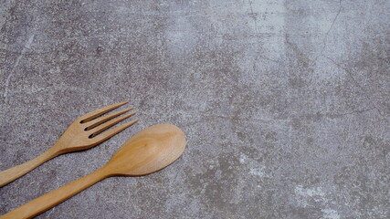 Wall Mural - Kitchen utensils made of wood. Food and beverage concept. Ornaments food photography. Kitchen concept.