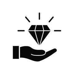 hand holding a diamond