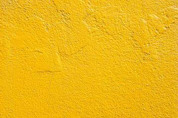 Sticker - surface of blank rough yellow concrete wall for background.