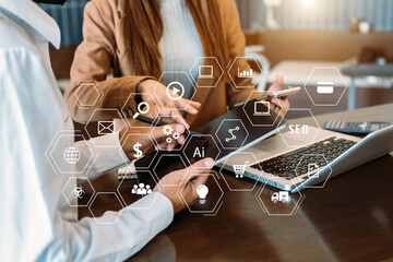 Business team open his hand, working touch screen computer, smartphone and tablet