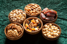Nuts And Dried Fruits In Bamboo Plates
