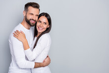 Photo Of Charming Dreamy Guy Lady Dressed White Shirts Looking Empty Space Hugging Isolated Grey Color Background
