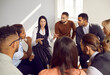 © Studio Romantic - Diverse businesspeople sit in row at office meeting brainstorm discuss company business idea or plant together. Multiracial group of employees talk engaged in teambuilding. Teamwork concept.