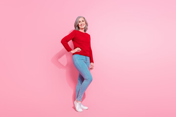 Wall Mural - Full length body size view of attractive cheerful grey-haired middle-aged woman posing isolated over pink pastel color background