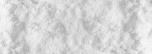 Background Of Fresh Snow Winter For Design Snowy White Texture, Closeup Top View Wide Panoramic Texture.
