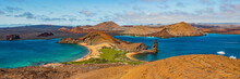 Galapagos Islands Travel Banner. Bartolome Island, Volcanic Islet In The Islas Galapagos Archipelago. Panoramic View Of Sullivan Bay, Golden Beach And Santiago Island From Hiking On Cruise Excursion.