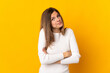 © luismolinero - Young Slovak woman isolated on yellow background making doubts gesture while lifting the shoulders