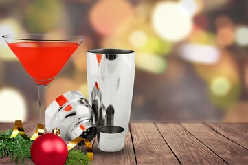 Poster - Winter alcoholic cocktail with berries, liquor for Christmas or New Year celebration. Holiday table setting