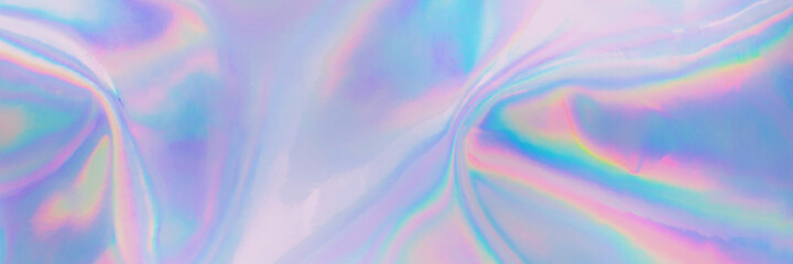 Poster - Blurred soft focused abstract trendy rainbow holographic banner background in 80s style. Textile texture in purple, violet, pink and mint soft pastel colors. Trendy ethereal candy colors backdrop.