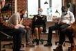 © DC Studio - People with mental issues at aa group therapy meeting to receive counseling from therapist. Patients dealing with alcohol addiction, attending aa support program during covid 19 pandemic.