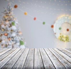 Wall Mural - Table space in front of defocused Christmas tree