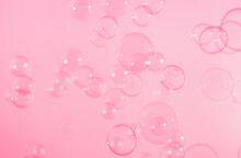 Beautiful Transparent Pink Soap Bubbles Natural Background. Celebration, Wedding Card. Blurred Pink Bubbles Backdrop. Valentine Pink Wallpaper.