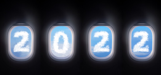 Wall Mural - cloud 2022 outside the plane window, four airplane windows open white window shutter wide with blue sky view and white cloud in 2022 shape