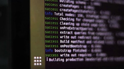 Wall Mural - closeup of a computer screen with running code.