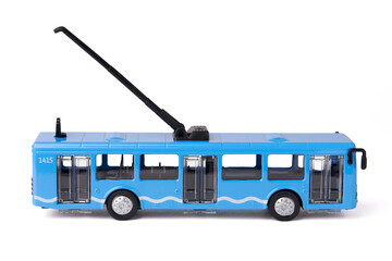 Collectible model of a blue trolleybus on a white background. Children's toy. Passenger transport