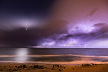 A Long Exposure, The Lightning Descends Like A Thunderbolt On The Sea, And The Thunder Comes Before It