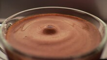 Espresso Coffee Drop Into The Filled Cup From The Coffee Machine In Slow Motion 4k Macro View 