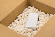 Cardboard box with styrofoam filler for safe packaging. Gift package