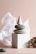 © Анна Мартьянова - minimal, art, stylish concept. boho and kinfolk design. zero waste, eco friendly holiday style. wooden christmas tree on podium stage,stone with paper