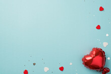 Top View Photo Of Valentine's Day Decorations Heart Shaped Balloon Red And White Hearts Confetti And Sequins On Isolated Pastel Blue Background With Copyspace