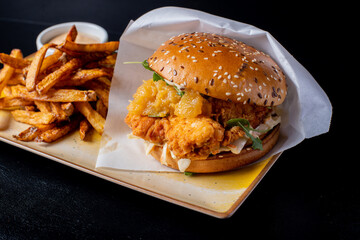 Wall Mural - details of tasty chicken burger with fries