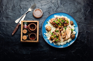 Wall Mural - Chicken breast with marsala sauce and rice