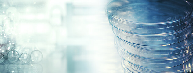 Wall Mural - petri dish for microbiology lab research in blue medical science information banner background
