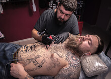 Master Create Tattoo In Studio