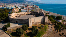 Aerial 4K Video From Drone To Fuengirola Historic Sohail Castle. Is Shown In The Background Rio Fuengirola Pedestrian Bridge.Fuengirola Malaga ,Spain, Europe (Series)