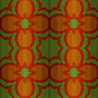 Knitting seamless vector pattern with flowers in green and orange hues as a fabric texture
