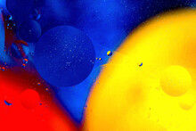 Abstract Colorful Background Of Oil Circles. Oil In Circles On The Water Surface, Water Foam And Oil Colored Bubbles.