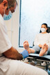 © Henko Studio - Chiropodist exploring a patient with diabetic foot in the medical center.