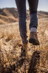 close up of men shoes hiking in the winter time