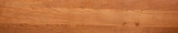 Fototapeta Fototapeta las, drzewa - Long and wide wooden texture panoramic background. Solid wood splicing long tabletop, cherry wood long board texture background.